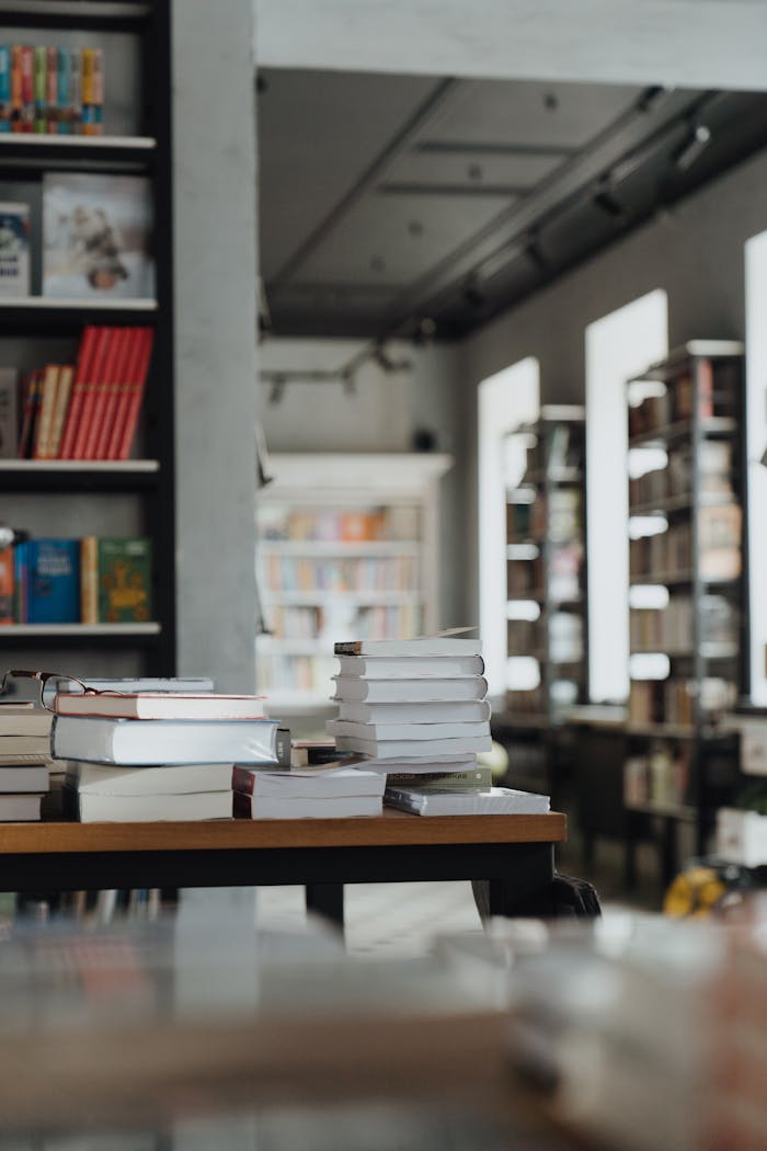 A serene bookshop interior showcasing stacks of books, perfect for reading enthusiasts.